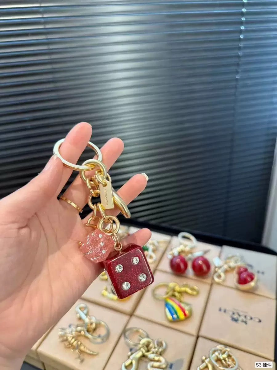 C O A C I-I Charm