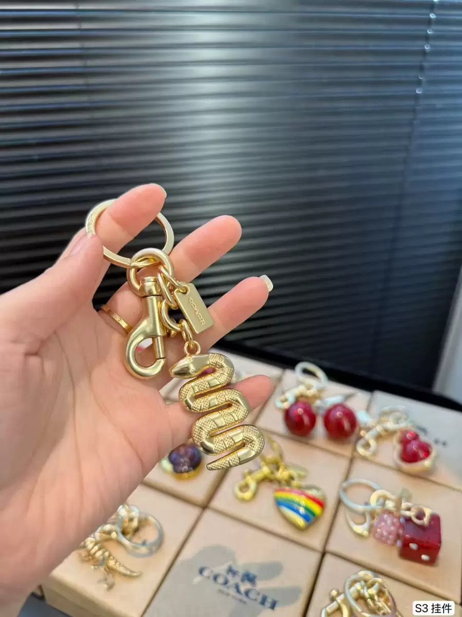 C O A C I-I Charm