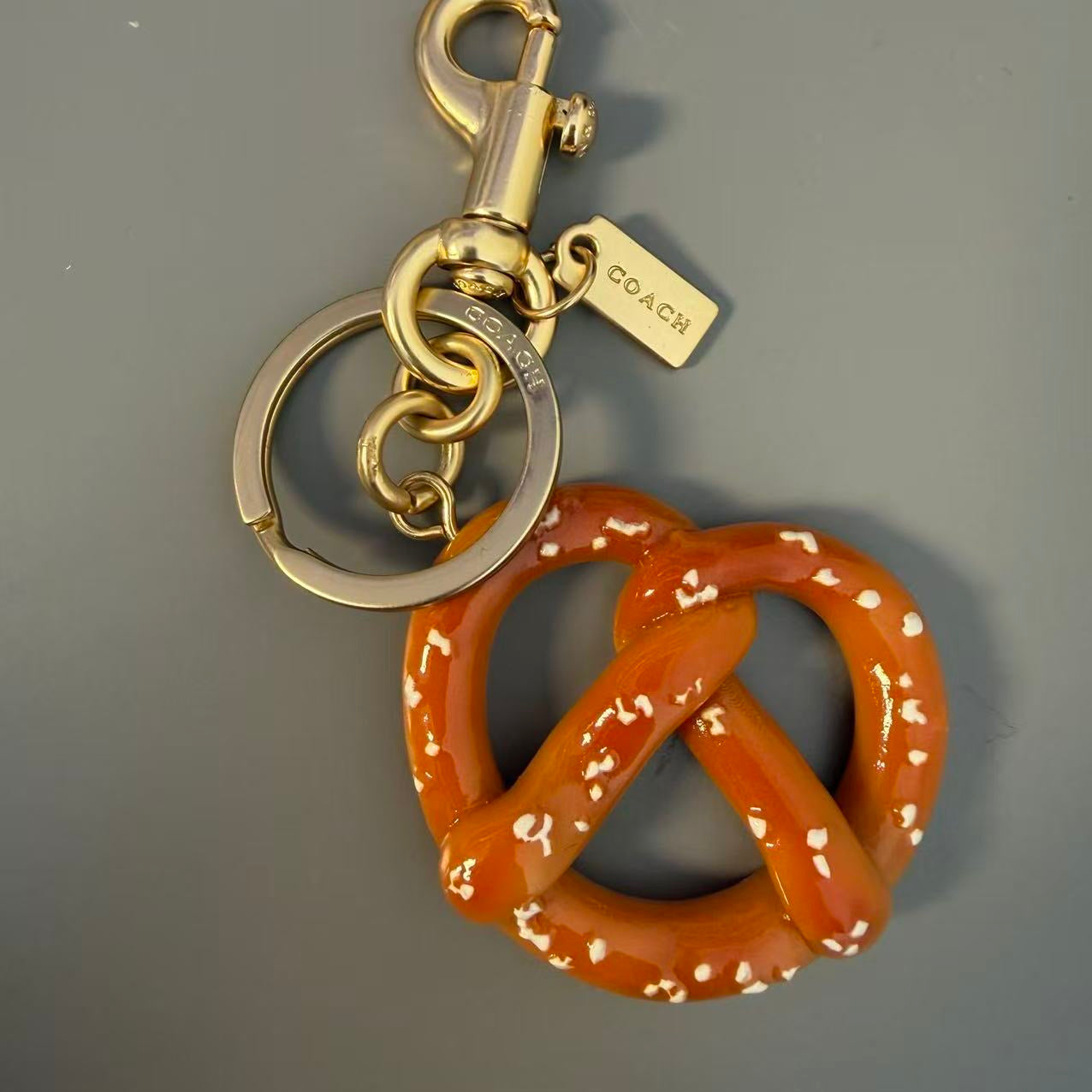 C O A C I-I Charm