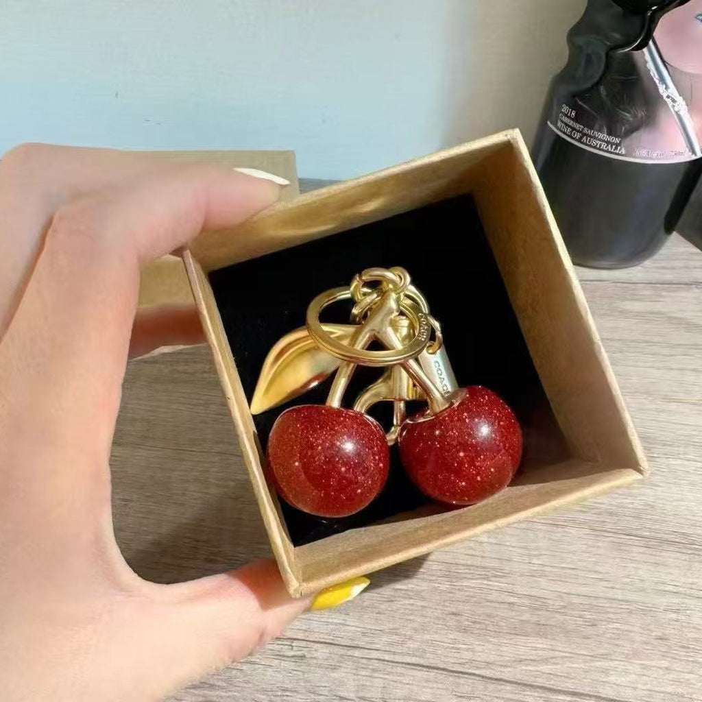 C O A C I-I Charm